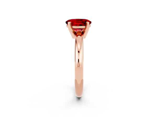 Rose gold Oval Cut Ruby Solitaire Engagement Ring with Round Band and Four-Prong Setting