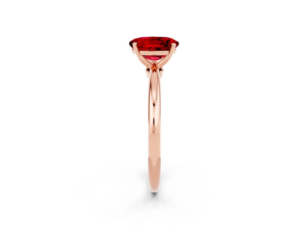 Rose gold Oval Cut Ruby Solitaire Ring with Six-Prong Setting and Classic Band
