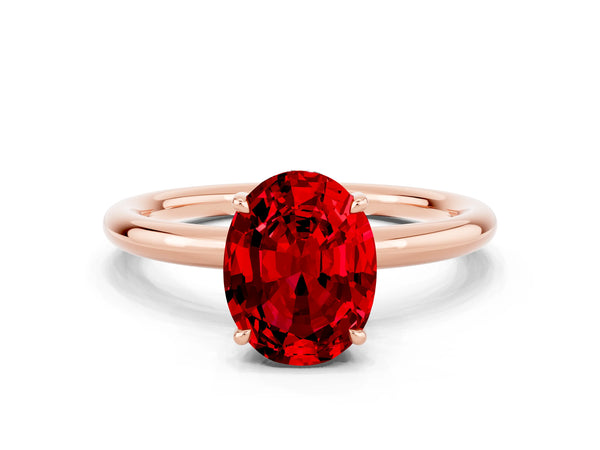 Rose gold Oval Cut Ruby Solitaire Ring with Thin Band and Four-Prong Setting