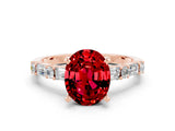 Rose gold Oval Cut Ruby Solitaire with Side Baguettes and Channel Set Band