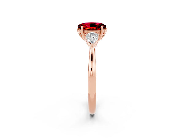 Rose gold Oval Cut Ruby Three-Stone Ring with Pear  Side Stones and Prong Setting