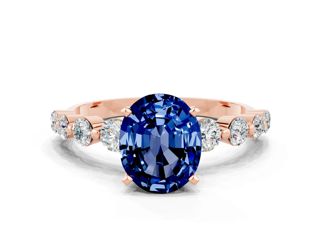 Rose gold Oval Cut Solitaire Blue Sapphire Ring with Pave Band and Four-Prong Setting