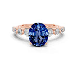 Rose gold Oval Cut Solitaire Blue Sapphire Ring with Pave Band and Four-Prong Setting