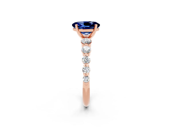 Rose gold Oval Cut Solitaire Blue Sapphire Ring with Pave Band and Four-Prong Setting