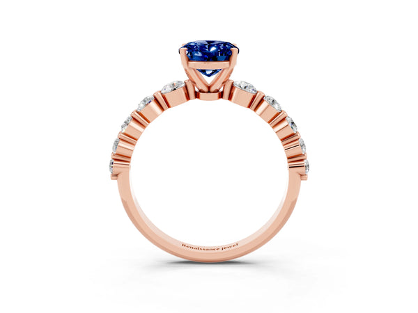 Rose gold Oval Cut Solitaire Blue Sapphire Ring with Pave Band and Four-Prong Setting