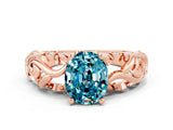Rose gold Oval Cut Solitaire Blue Topaz Leaf-Inspired Vine Band Ring with Prong Setting