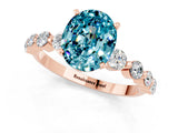 Rose gold Oval Cut Solitaire Blue Topaz Ring with Pave Band and Four-Prong Setting_1