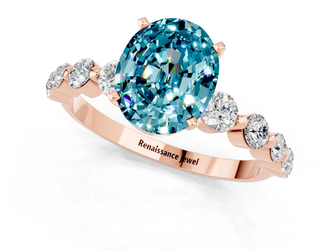 Rose gold Oval Cut Solitaire Blue Topaz Ring with Pave Band and Four-Prong Setting_1