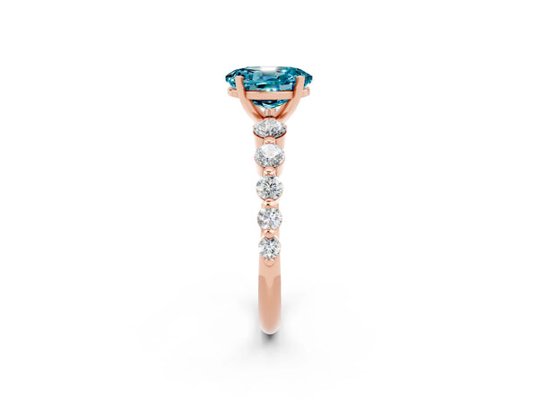 Rose gold Oval Cut Solitaire Blue Topaz Ring with Pave Band and Four-Prong Setting
