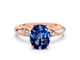 Rose gold Oval Cut Solitaire Diamond Engagement Ring with Twisted Pave Band and Four-Prong Setting