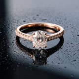 Rose gold Oval Cut Solitaire Diamond Ring with Pave Band and Four-Prong Setting_7