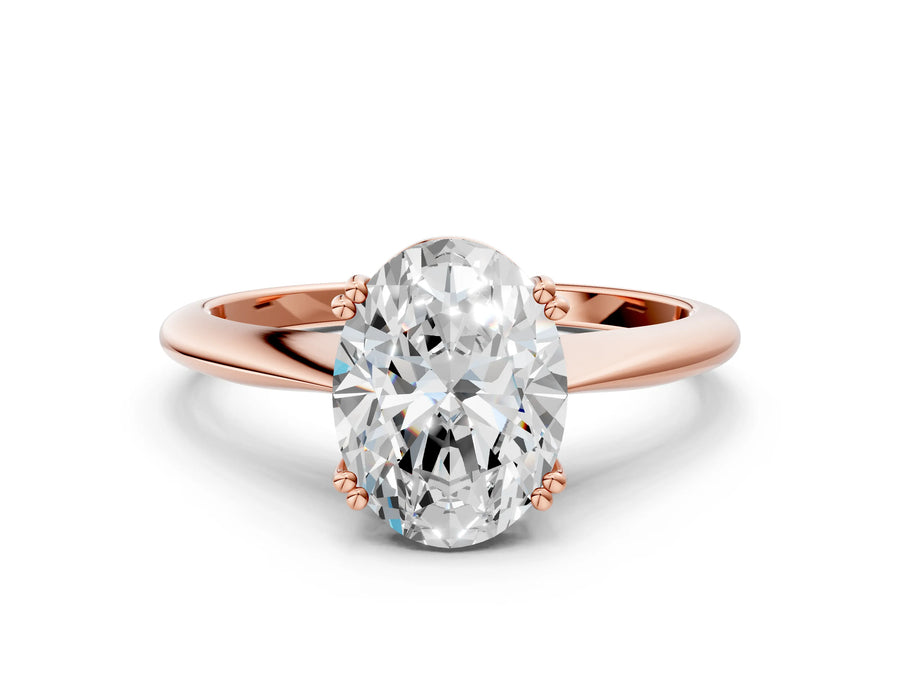 Rose gold Oval Cut Solitaire Diamond Ring with Six-Prong Setting and Classic Band