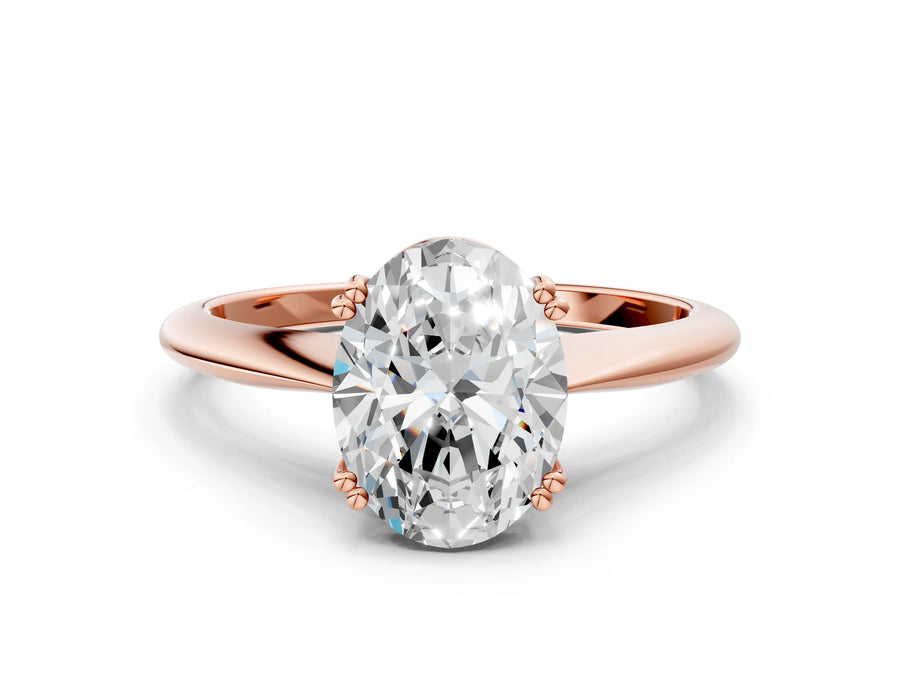 Rose gold Oval Cut Solitaire Diamond Ring with Six-Prong Setting and Classic Band