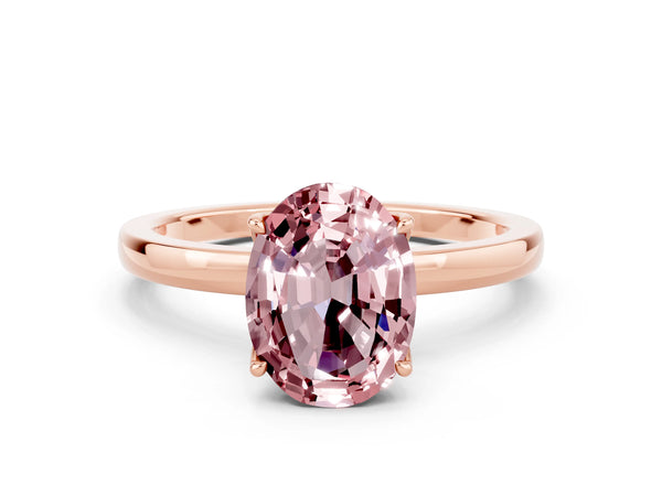 Rose gold Oval Cut Solitaire Diamond Ring with Thin Band and Four-Prong Setting