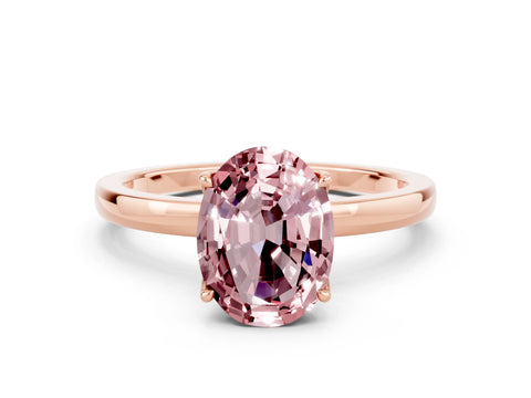 Rose gold Oval Cut Solitaire Diamond Ring with Thin Band and Four-Prong Setting