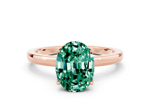Rose gold Oval Cut Solitaire Diamond Ring with Thin Band and Four-Prong Setting