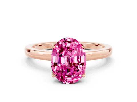 Rose gold Oval Cut Solitaire Diamond Ring with Thin Band and Four-Prong Setting