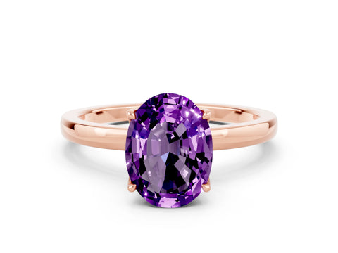 Rose gold Oval Cut Solitaire Diamond Ring with Thin Band and Four-Prong Setting