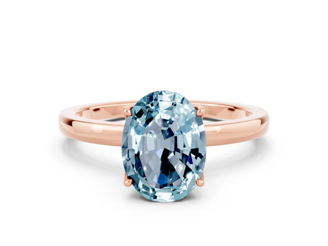 Rose gold Oval Cut Solitaire Diamond Ring with Thin Band and Four-Prong Setting