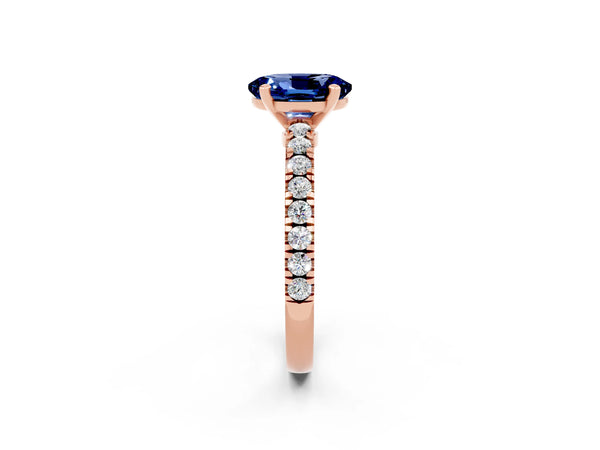 Rose gold Oval Cut Solitaire Blue Sapphire with Pavé Band and Four-Prong Setting