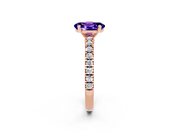 Rose gold Oval Cut Solitaire Tanzanite with Pavé Band and Four-Prong Setting