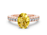 Rose gold Oval Cut Solitaire Diamond with Pavé Band and Four-Prong Setting