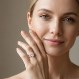Rose gold Oval Cut Solitaire Diamond with Side Stones on Criss-Cross Band and Four-Prong Setting_14