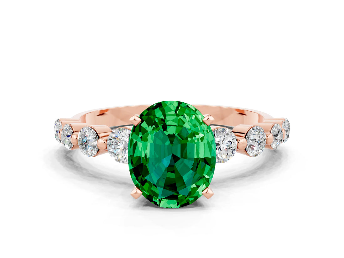 Rose gold Oval Cut Solitaire Emerald Ring with Pave Band and Four-Prong Setting