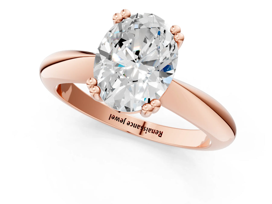 Rose gold Oval Cut Solitaire Engagement Ring with Tapered Band and Four-Prong Setting