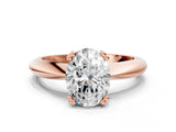 Rose gold Oval Cut Solitaire Engagement Ring with Tapered Band and Four-Prong Setting