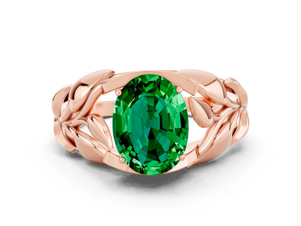 Rose gold Oval Cut Emerald Leaf-Inspired Engagement Ring with Round Accents and Prong Setting