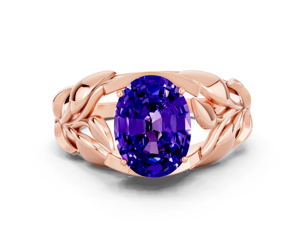 Rose gold Oval Cut Tanzanite Leaf-Inspired Engagement Ring with Round Accents and Prong Setting