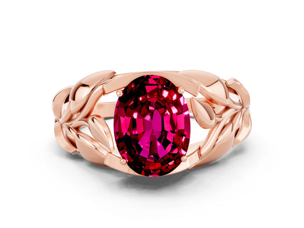 Rose gold Oval Cut Garnet Leaf-Inspired Engagement Ring with Round Accents and Prong Setting