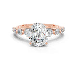 Rose gold Oval Cut Solitaire Moissanite Ring with Pave Band and Four-Prong Setting