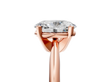 Rose gold Oval Cut Solitaire Ring with Four-Prong Setting on a Classic Band_63