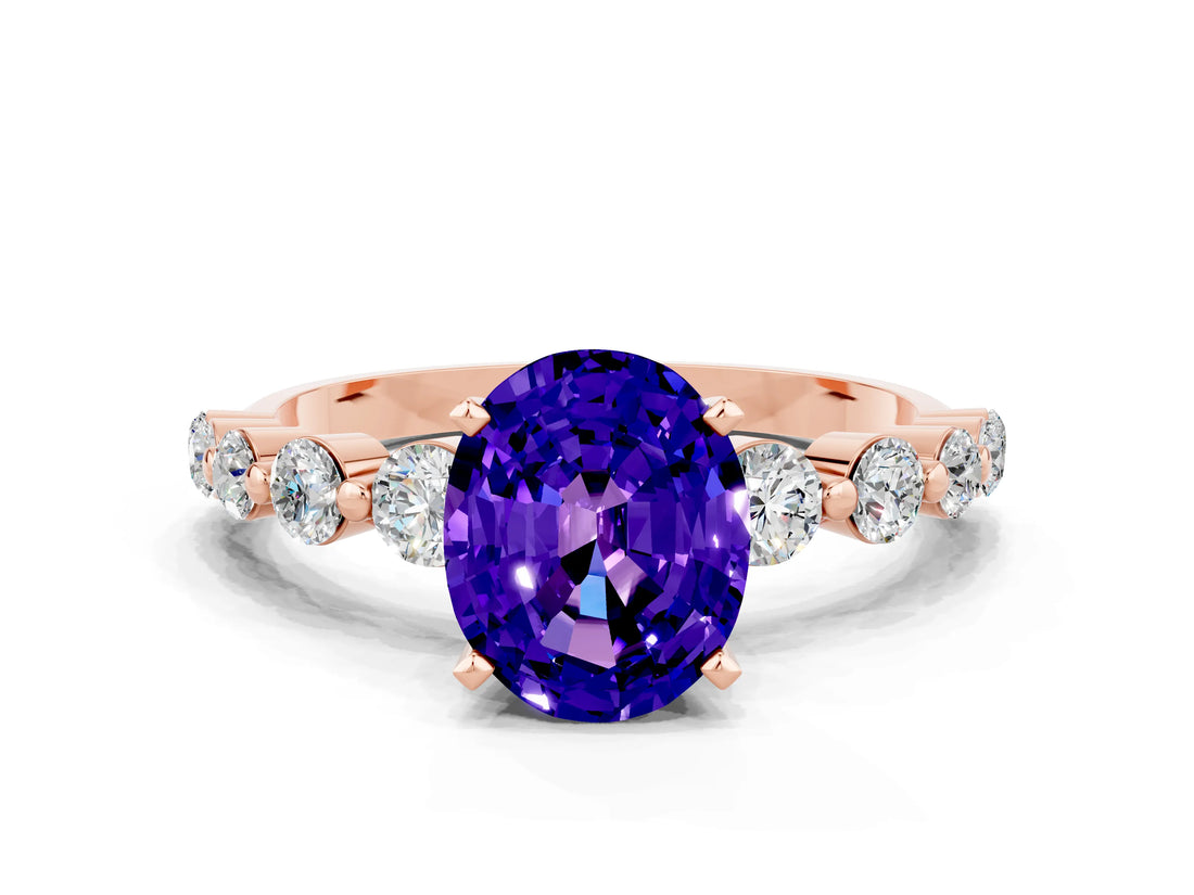Rose gold Oval Cut Solitaire Tanzanite Ring with Pave Band and Four-Prong Setting