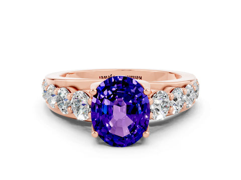 Rose gold Oval Cut Tanzanite Engagement Ring with Pavé Band and Four-Prong Setting