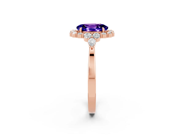 Rose gold Oval Cut Tanzanite Halo Ring with Pear Side Stones and Prong Setting