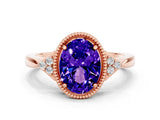 Rose gold Oval Cut Tanzanite Halo Ring with Tapered Band and Four-Prong Setting