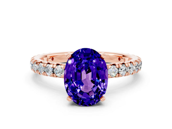 Rose gold Oval Cut Tanzanite Pavé Solitaire Ring with Round Band and Prong Setting