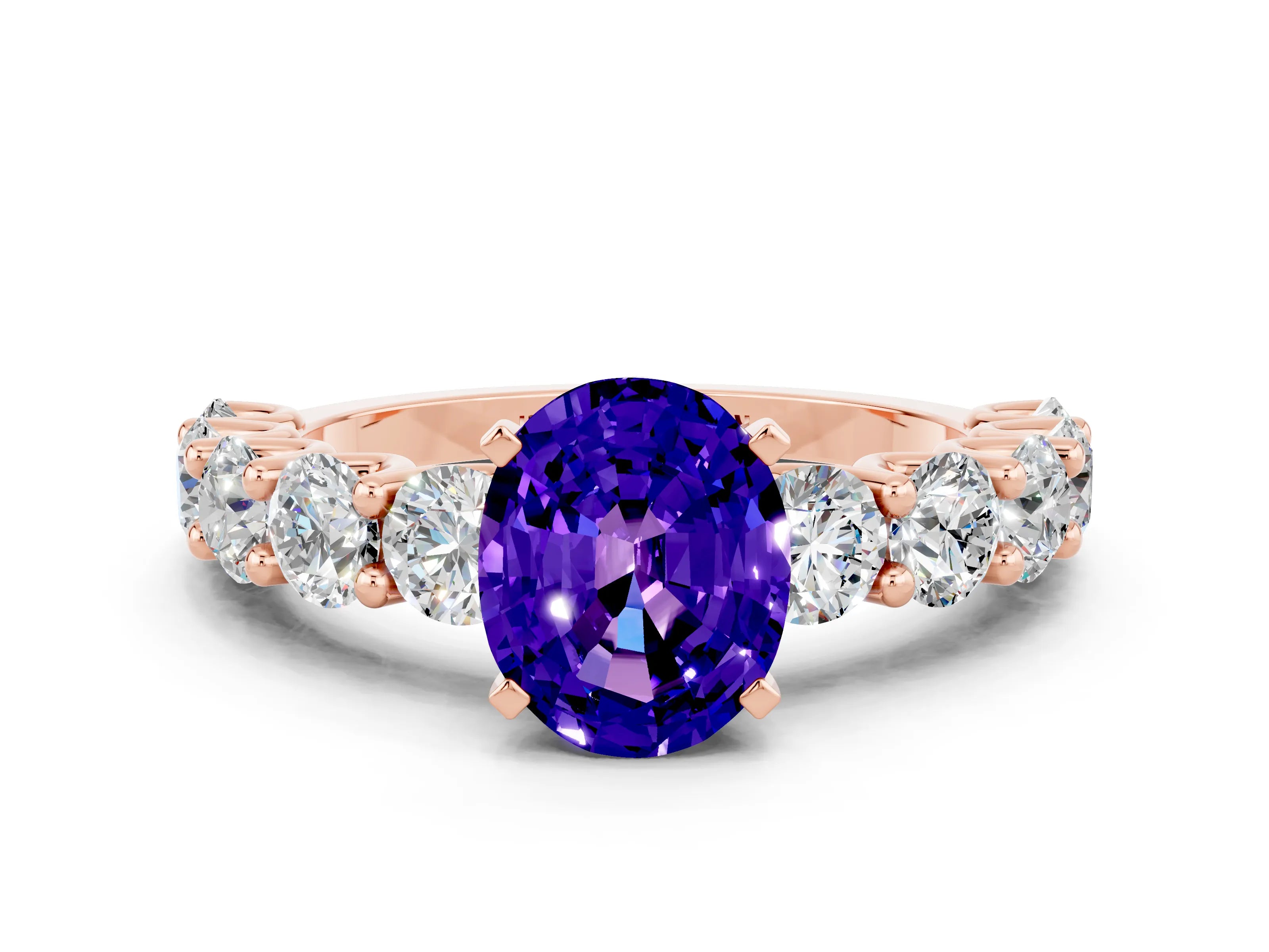 Rose gold Oval Cut Tanzanite Prong Setting with Side Stones on a Pave Band