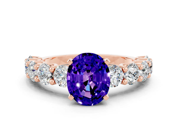 Rose gold Oval Cut Tanzanite Prong Setting with Side Stones on a Pave Band