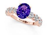 Rose gold Oval Cut Tanzanite Prong Setting with Side Stones on a Pave Band_1