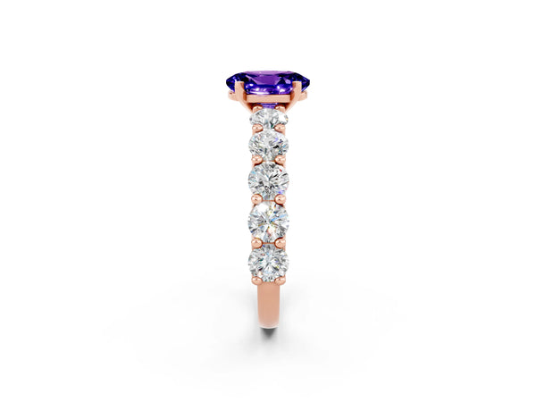 Rose gold Oval Cut Tanzanite Prong Setting with Side Stones on a Pave Band