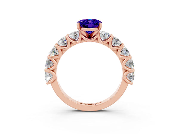 Rose gold Oval Cut Tanzanite Prong Setting with Side Stones on a Pave Band
