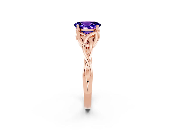 Rose gold Oval Cut Tanzanite Solitaire Celtic Knot Ring with Four-Prong Setting