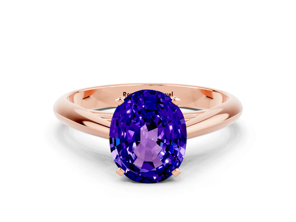 Rose gold Oval Cut Tanzanite Solitaire Engagement Ring with Cathedral Setting and Four-Prong Mount