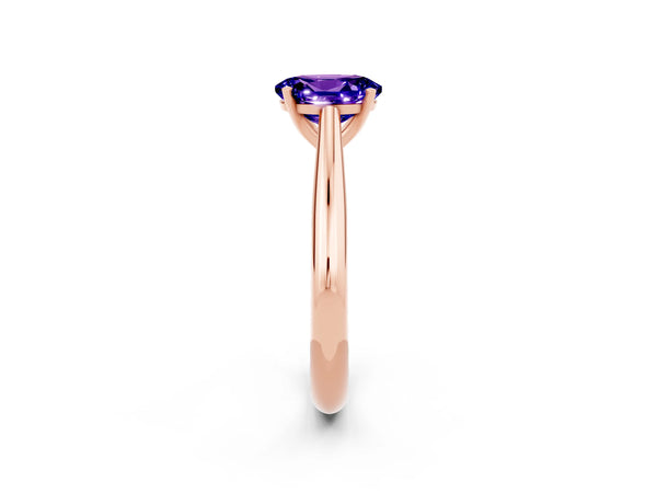 Rose gold Oval Cut Tanzanite Solitaire Engagement Ring with Cathedral Setting and Four-Prong Mount