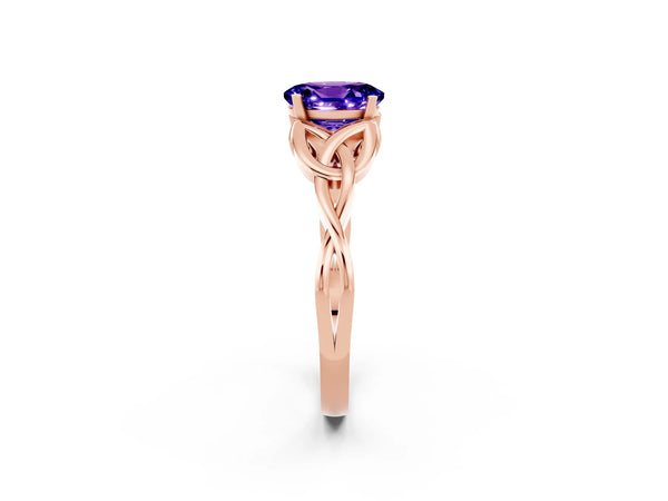 Rose gold Oval Cut Tanzanite Solitaire Engagement Ring with Celtic Knot Band and Four-Prong Setting