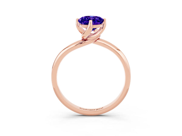 Rose gold Oval Cut Tanzanite Solitaire Engagement Ring with Four-Prong Setting and Classic Band